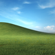 Imagen para el artículo titulado Microsoft relanza el mítico fondo de pantalla de Windows XP, ahora con más flores y detalles